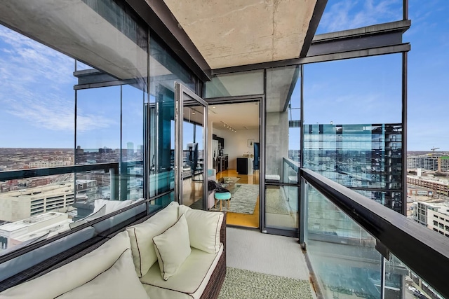 balcony featuring a city view