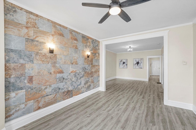 1238 S Harding Ave, Chicago, IL 60623 - empty room with crown molding, baseboards, wood finished floors, and a ceiling fan