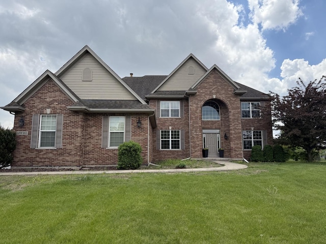 43W465 Otter Ln, Saint Charles, IL 60175 - traditional-style home featuring brick siding, a front lawn, and a shingled roof
