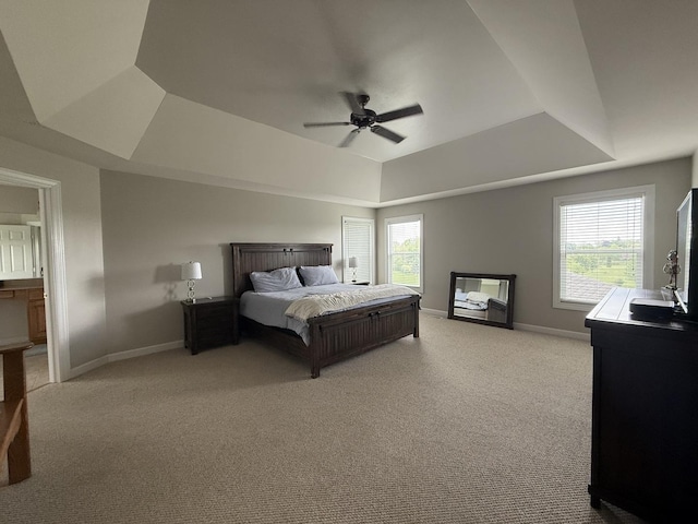 43W465 Otter Ln, Saint Charles, IL 60175 - carpeted bedroom featuring a raised ceiling, multiple windows, baseboards, and a ceiling fan