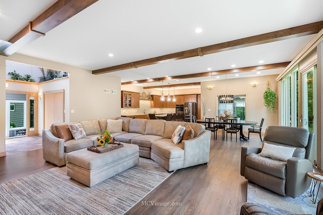 14530 136th St, Lemont, IL 60439 - living area with beam ceiling, recessed lighting, light wood-type flooring, and a chandelier