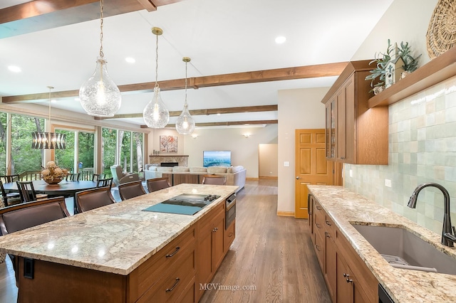 14530 136th St, Lemont, IL 60439 - kitchen featuring a sink, wood finished floors, decorative backsplash, brown cabinets, and beamed ceiling
