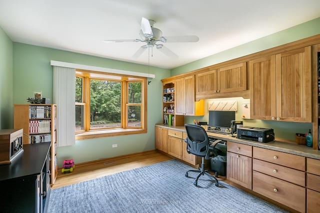 14530 136th St, Lemont, IL 60439 - office with built in study area, a ceiling fan, and light wood finished floors