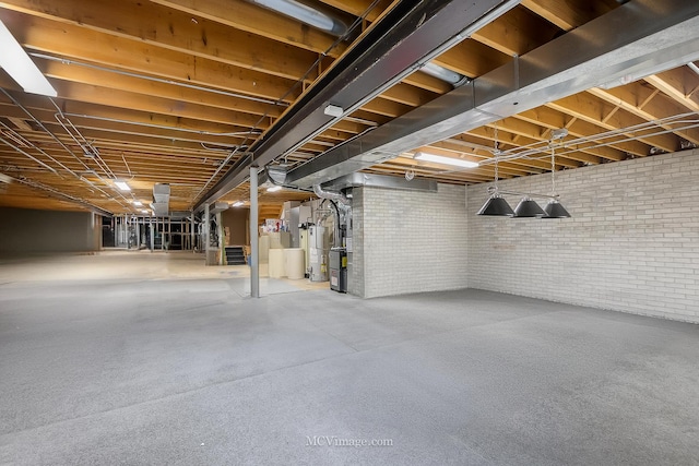 14530 136th St, Lemont, IL 60439 - unfinished below grade area with brick wall and water heater