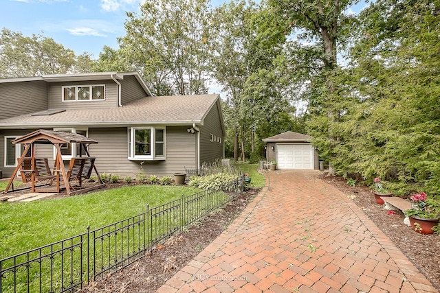 14530 136th St, Lemont, IL 60439 - view of front facade with an outdoor structure, a gazebo, decorative driveway, a detached garage, and a shingled roof