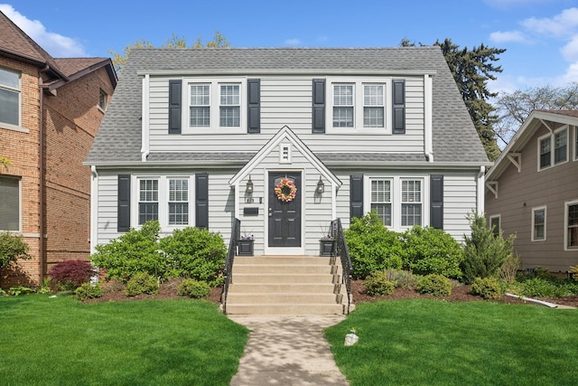 225 N Knight Ave, Park Ridge, IL 60068 - view of front of property with a front yard and a shingled roof