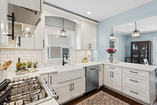 225 N Knight Ave, Park Ridge, IL 60068 - kitchen with dishwasher, a sink, a peninsula, range with gas stovetop, and white cabinetry