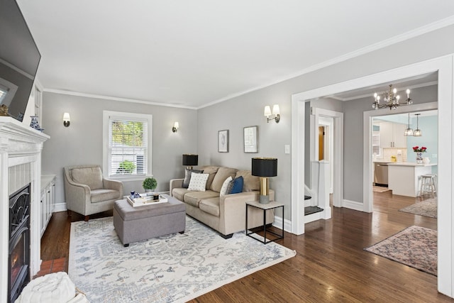 225 N Knight Ave, Park Ridge, IL 60068 - living area featuring a glass covered fireplace, a chandelier, dark wood-type flooring, crown molding, and baseboards
