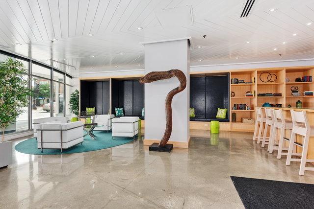 50 E 16th St Unit 312, Chicago, IL 60616 - community lobby featuring floor to ceiling windows and wooden ceiling