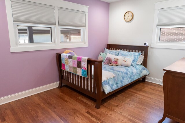 4937 N Opal Ave, Norridge, IL 60706 - bedroom with baseboards and wood finished floors