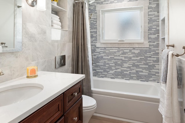 4937 N Opal Ave, Norridge, IL 60706 - bathroom with shower / bath combination with curtain, toilet, vanity, and tile walls
