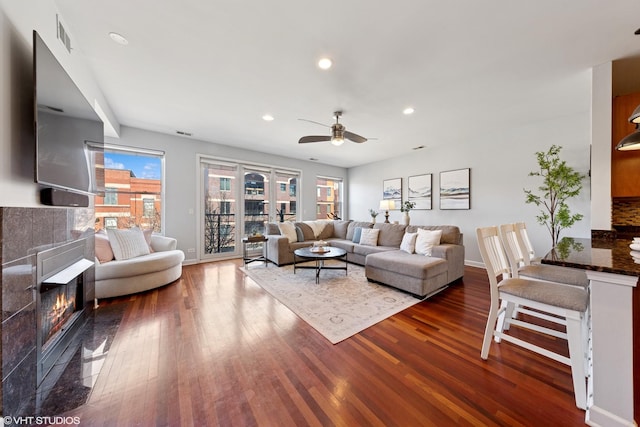 1907 W Chicago Ave Unit 3, Chicago, IL 60622 - living room featuring wood finished floors, ceiling fan, baseboards, a tiled fireplace, and recessed lighting
