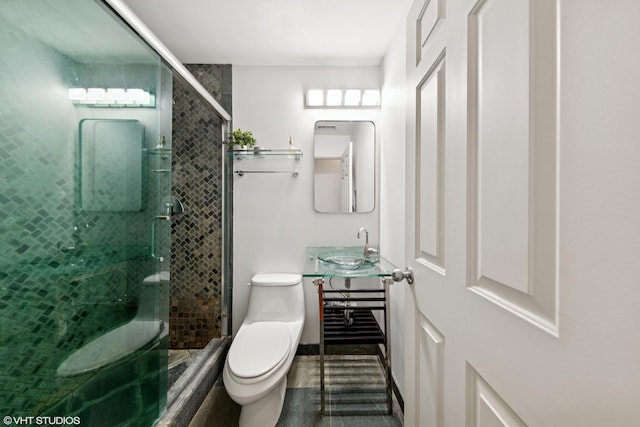 1907 W Chicago Ave Unit 3, Chicago, IL 60622 - bathroom featuring toilet, a stall shower, baseboards, and vanity