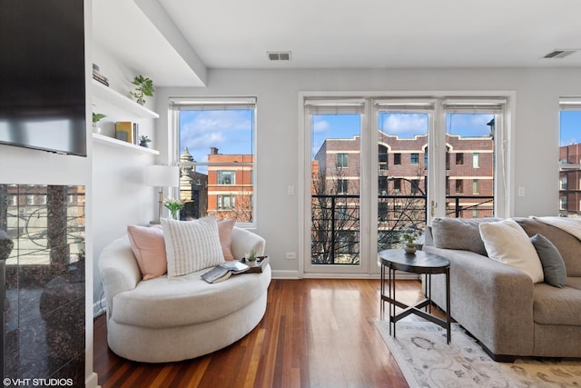 1907 W Chicago Ave Unit 3, Chicago, IL 60622 - living area with wood finished floors, healthy amount of natural light, and baseboards