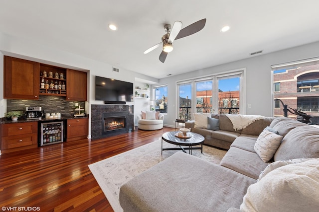 1907 W Chicago Ave Unit 3, Chicago, IL 60622 - living area with wine cooler, bar area, dark wood-style floors, a ceiling fan, and a tiled fireplace