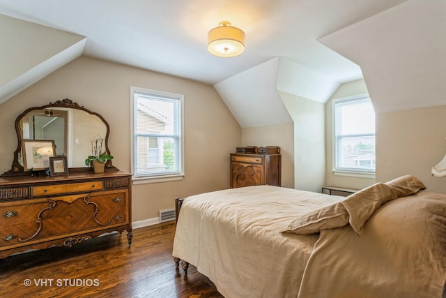 496 Longcommon Rd, Riverside, IL 60546 - bedroom featuring multiple windows, dark wood finished floors, lofted ceiling, and baseboards