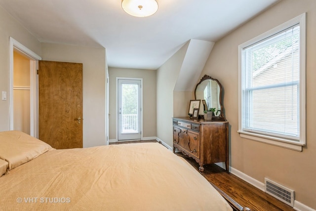 496 Longcommon Rd, Riverside, IL 60546 - bedroom with baseboards, dark wood-style floors, and access to outside
