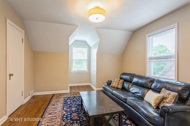 496 Longcommon Rd, Riverside, IL 60546 - living room featuring wood finished floors, plenty of natural light, baseboards, and lofted ceiling