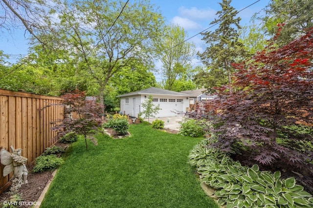 496 Longcommon Rd, Riverside, IL 60546 - view of yard featuring a detached garage