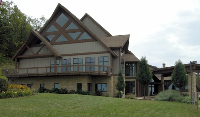 139 Walnut Hill Dr, Galena, IL 61036 - back of house with a lawn and stone siding