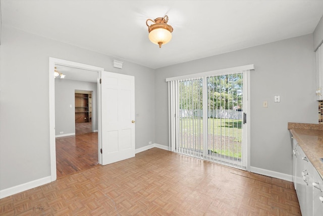 255 Irving Blvd, Chicago Heights, IL 60411 - unfurnished dining area featuring baseboards
