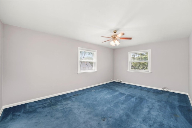255 Irving Blvd, Chicago Heights, IL 60411 - unfurnished room with healthy amount of natural light, baseboards, and a ceiling fan