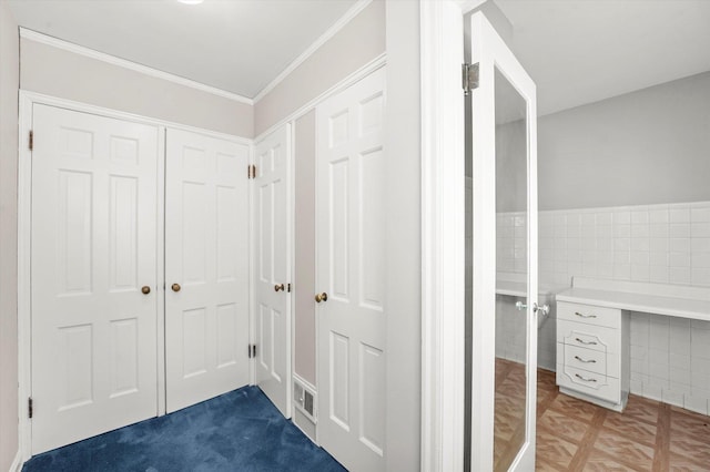 255 Irving Blvd, Chicago Heights, IL 60411 - corridor with tile walls, crown molding, and wainscoting