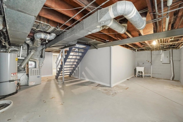 255 Irving Blvd, Chicago Heights, IL 60411 - unfinished below grade area with gas water heater, electric panel, stairs, and heating unit