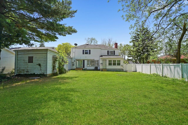 255 Irving Blvd, Chicago Heights, IL 60411 - rear view of house featuring a chimney