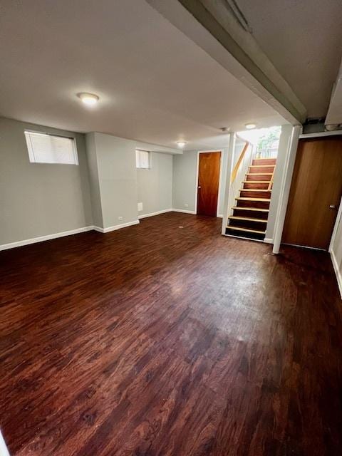 14230 S State St, Riverdale, IL 60827 - basement featuring dark wood-type flooring, stairway, and baseboards