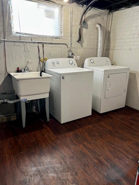 14230 S State St, Riverdale, IL 60827 - laundry room with washing machine and dryer and dark wood finished floors