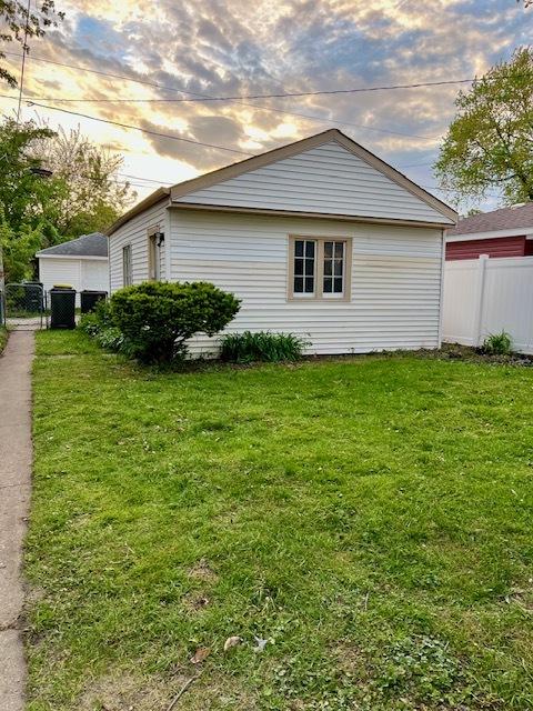14230 S State St, Riverdale, IL 60827 - view of property exterior at dusk