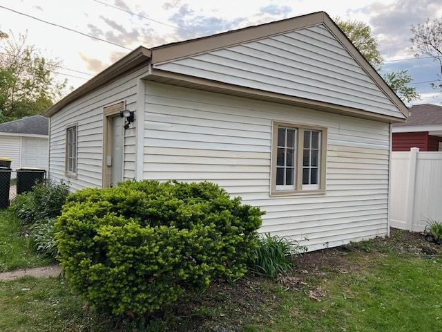 14230 S State St, Riverdale, IL 60827 - view of side of property with fence and central AC