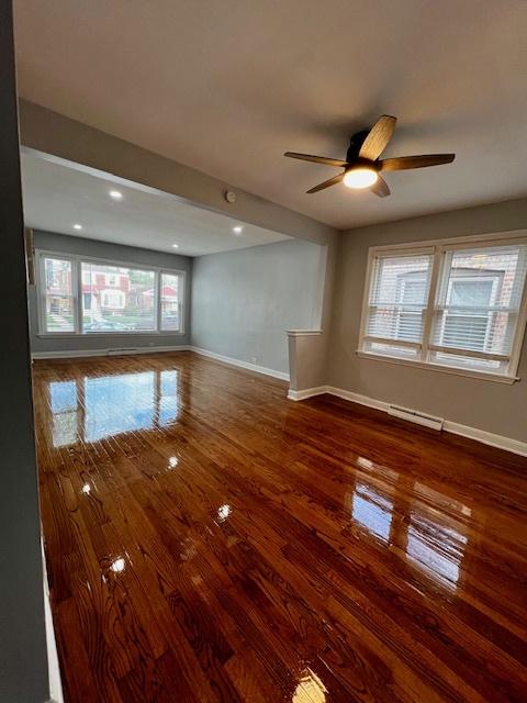 14230 S State St, Riverdale, IL 60827 - spare room featuring baseboards, wood finished floors, ceiling fan, and recessed lighting
