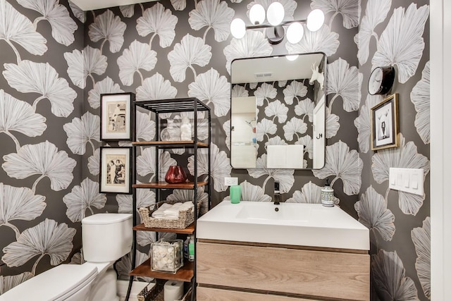 half bath with toilet and vanity
