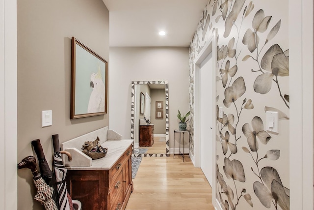 bathroom with wood finished floors, recessed lighting, and vanity