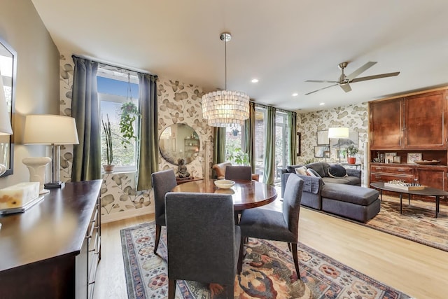 dining area featuring ceiling fan and wood finished floors