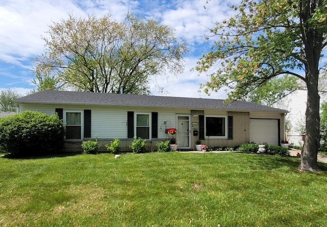 ranch-style home with a garage, a front yard, and brick siding