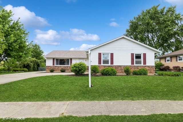 11616 Ronald St, Huntley, IL 60142 - single story home featuring brick siding, a front lawn, and driveway