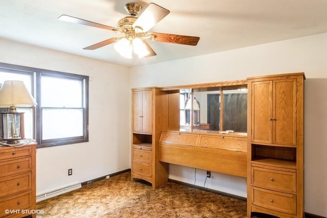 11616 Ronald St, Huntley, IL 60142 - carpeted bedroom featuring baseboard heating, baseboards, and a ceiling fan