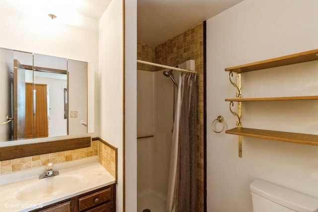 11616 Ronald St, Huntley, IL 60142 - bathroom with a shower stall, vanity, backsplash, and toilet