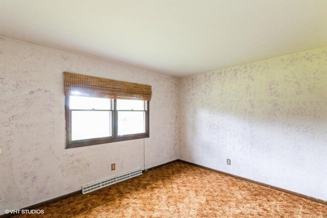 11616 Ronald St, Huntley, IL 60142 - empty room with carpet and baseboards
