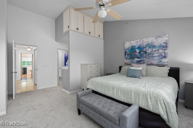 1102 E Cambria Ln, Lombard, IL 60148 - bedroom featuring light colored carpet, a high ceiling, baseboards, a ceiling fan, and connected bathroom