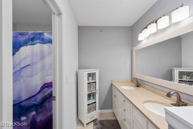1102 E Cambria Ln, Lombard, IL 60148 - full bath featuring double vanity and baseboards