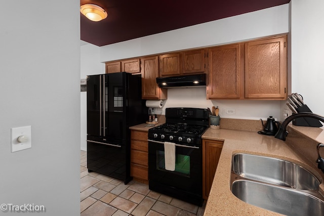 1102 E Cambria Ln, Lombard, IL 60148 - kitchen featuring black appliances, under cabinet range hood, a sink, brown cabinetry, and light tile patterned floors