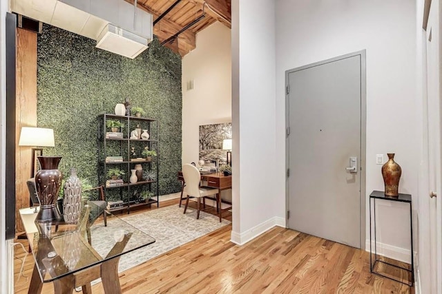 770 W Gladys Ave Unit 204, Chicago, IL 60661 - foyer with a high ceiling, wood finished floors, and baseboards
