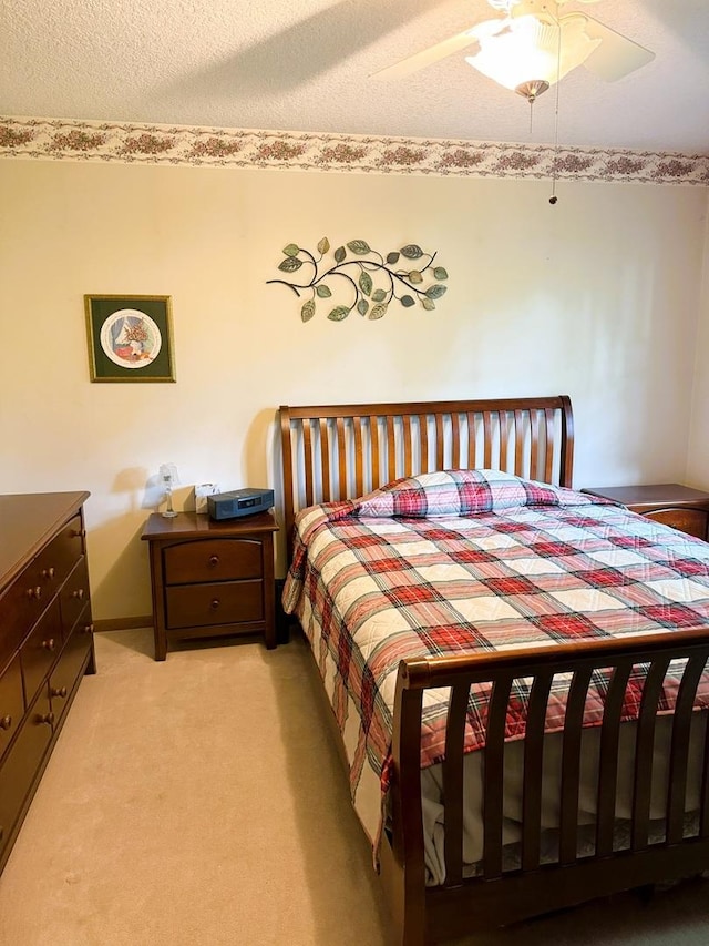 1004 N Hill Dr, Dixon, IL 61021 - bedroom with light colored carpet and a ceiling fan