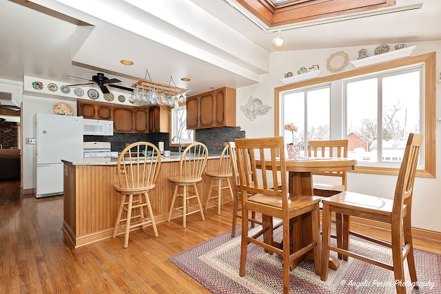 41551 N Lotus Ave, Antioch, IL 60002 - dining area featuring light wood-type flooring and a ceiling fan