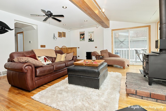 41551 N Lotus Ave, Antioch, IL 60002 - living room with a wood stove, light wood finished floors, a ceiling fan, and recessed lighting