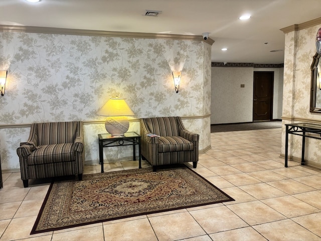 common area featuring wallpapered walls, ornamental molding, a surveillance system, and recessed lighting